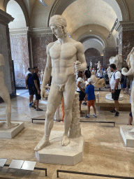 Statue of Ares and other statues at the Parthenon Room at the Ground Floor of the Sully Wing of the Louvre Museum, with explanation