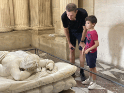 Tim and Max with the statue `Sleeping Hermaphrodite` at the Salle des Cariatides room at the Ground Floor of the Sully Wing of the Louvre Museum