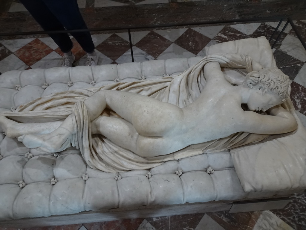 Statue `Sleeping Hermaphrodite` at the Salle des Cariatides room at the Ground Floor of the Sully Wing of the Louvre Museum