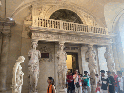 The Caryatid statues at the Salle des Cariatides room at the Ground Floor of the Sully Wing of the Louvre Museum