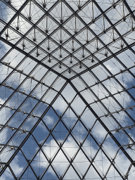 The Louvre Pyramid at the Cour Napoleon courtyard, viewed from the lobby at the Lower Ground Floor of the Louvre Museum