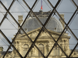 The top of the Pavillon de l`Horloge pavilion at the Sully Wing of the Louvre Museum, viewed from the lobby at the Lower Ground Floor