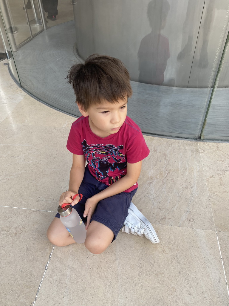 Max at the lobby at the Lower Ground Floor of the Louvre Museum