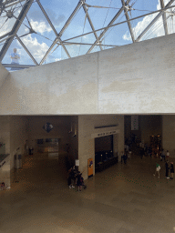 The lobby at the Lower Ground Floor of the Louvre Museum, viewed from the staircase to the Louvre Pyramid at the Cour Napoleon courtyard