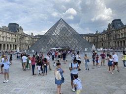 The Louvre Pyramid and the front of the Sully Wing of the Louvre Museum at the Cour Napoléon courtyard