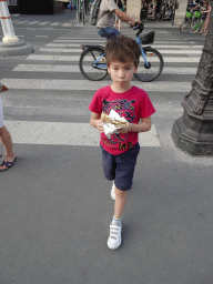 Max with a crêpe at the Rue de Rivoli street