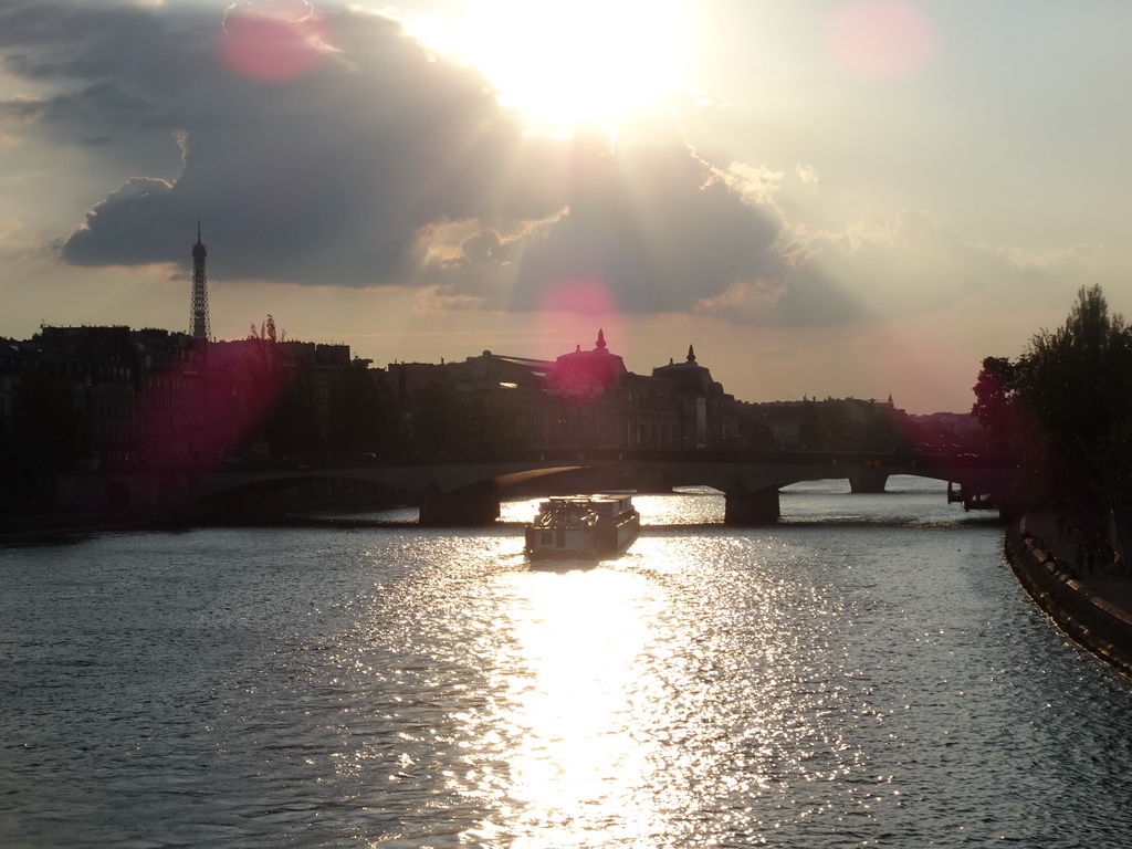 The Pont du Caroussel and Pont Royal bridges over the Seine river and the Eiffel Tower, viewed from the Pont des Arts bridge