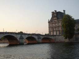 The Pont Royal bridge over the Seine river and the École du Louvre building, viewed from the Promenade Marceline Loridan-Ivens