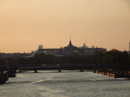 The Passerelle Léopold-Sédar-Senghor and Pont de la Concorde bridges over the Seine river and the Galeries Nationales du Grand Palais museum, viewed from the Pont Royal bridge