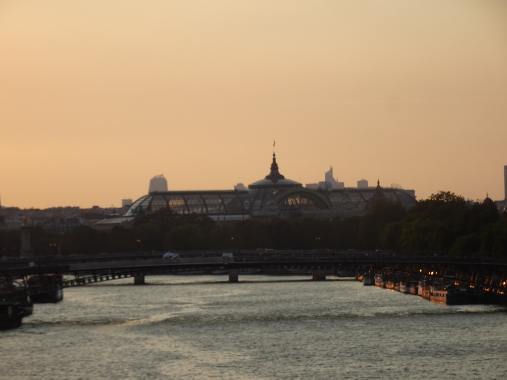 The Passerelle Léopold-Sédar-Senghor and Pont de la Concorde bridges over the Seine river and the Galeries Nationales du Grand Palais museum, viewed from the Pont Royal bridge