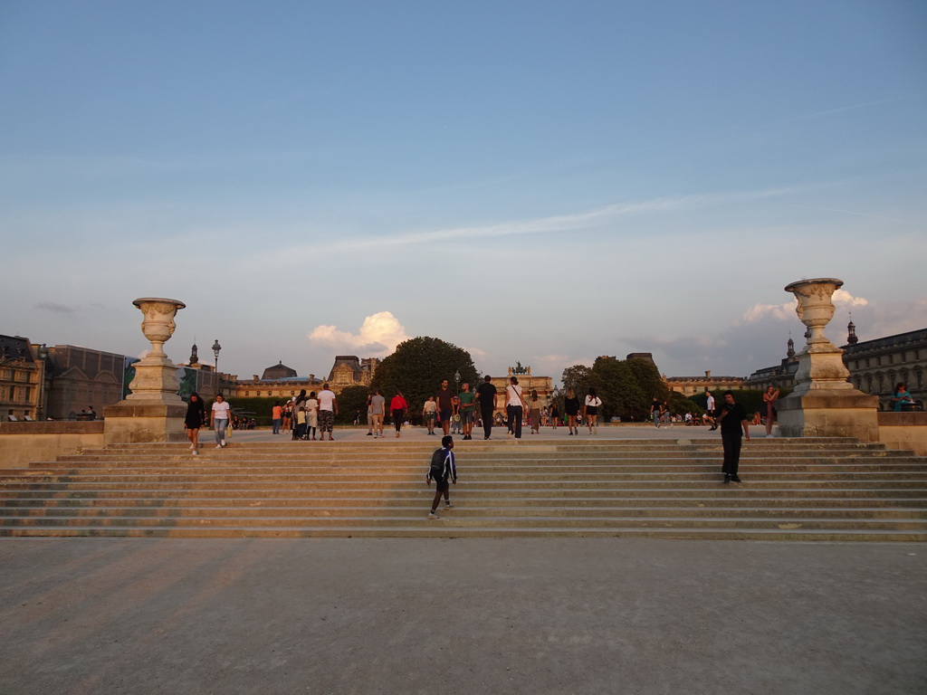 The Jardin du Carrousel garden with the west side of the Arc de Triomphe du Carrousel and the Louvre Museum, viewed from the Avenue du Général Lemonnier