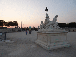 Sculpture at the Tuileries Gardens and the Place de la Concorde square with the Luxor Obelisk