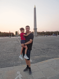 Tim and Max in front of the Luxor Obelisk at the Place de la Concorde square, at sunset