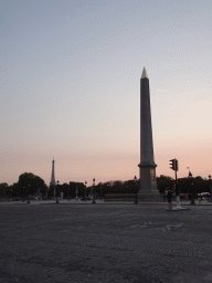 The Place de la Concorde square with the Luxor Obelisk and a view on the Eiffel Tower, at sunset