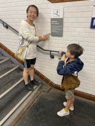 Miaomiao and Max at the bottom of the staircase at the Abbesses subway station