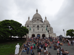Front of the Basilique du Sacré-Coeur church, viewed from the viewing point at the Square Louise Michel