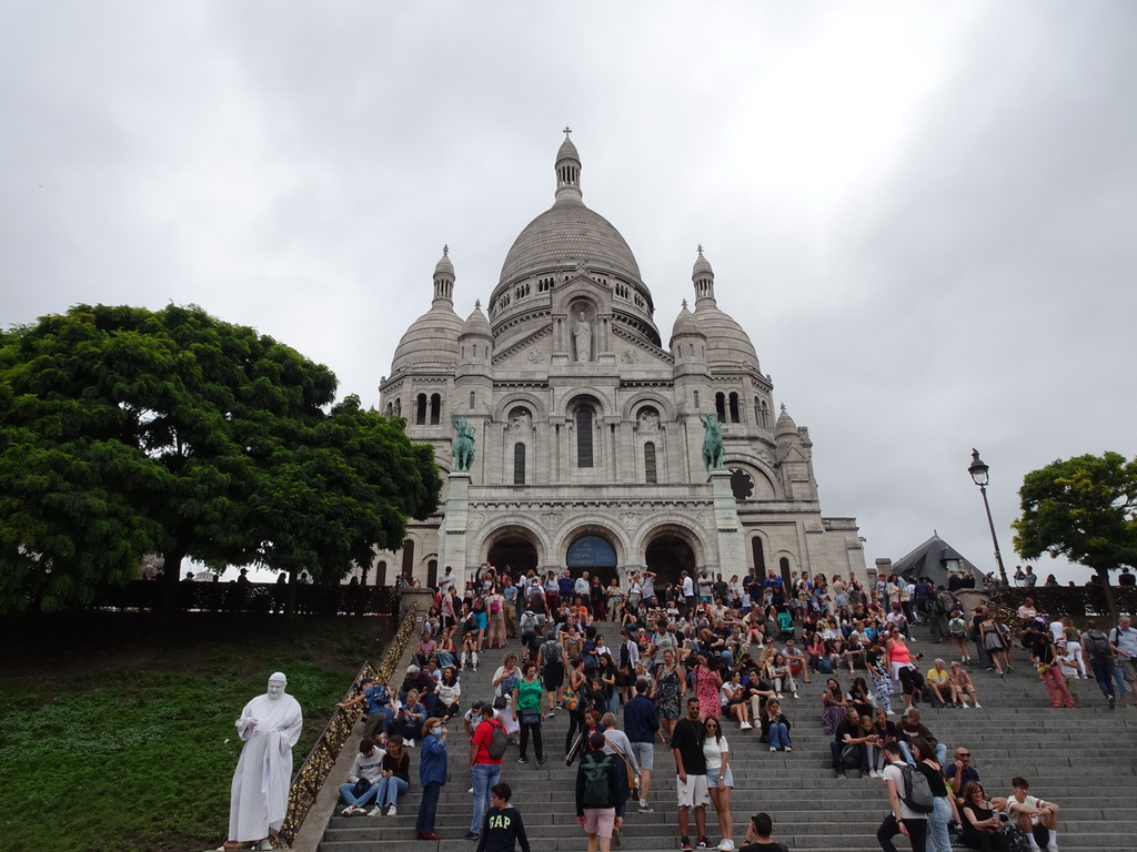 Front of the Basilique du Sacré-Coeur church, viewed from the viewing point at the Square Louise Michel