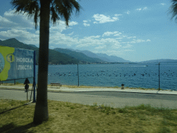 Beach at the town of Bijela and the Bay of Kotor, viewed from the tour bus on the E65 road
