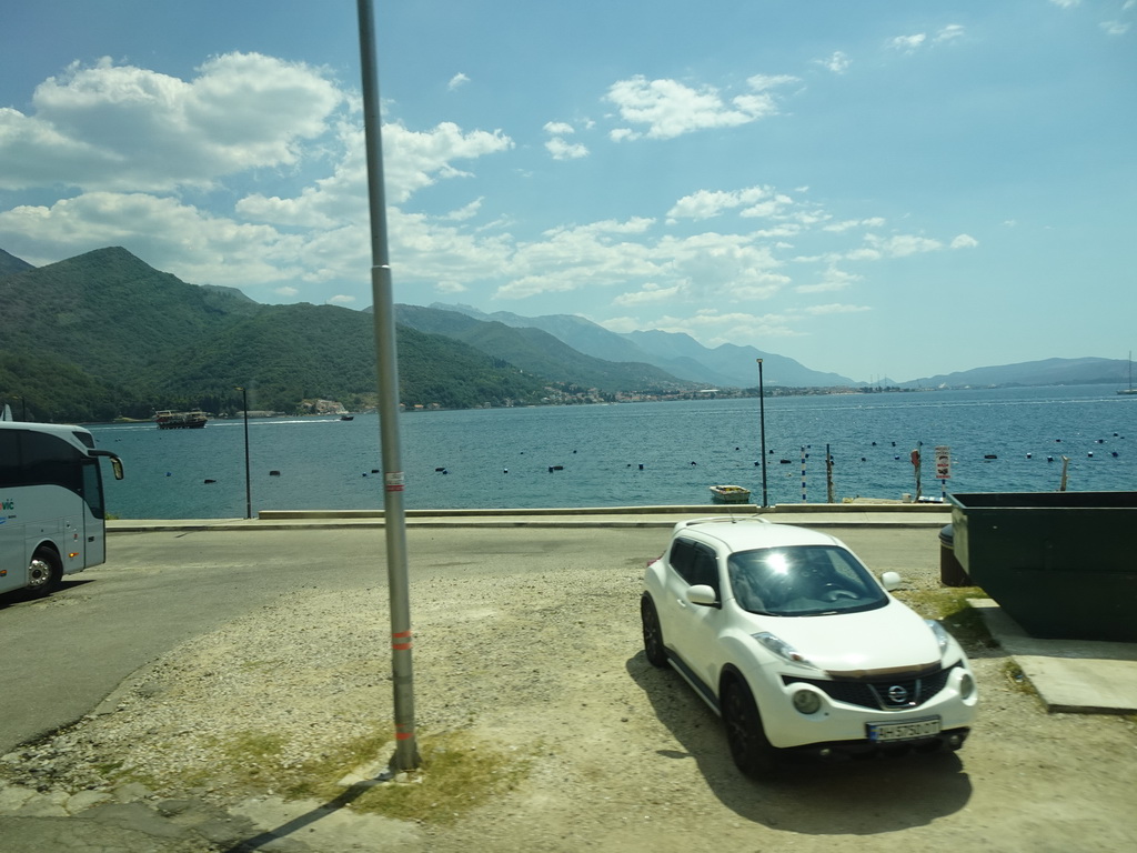 Beach at the town of Joice and the Bay of Kotor, viewed from the tour bus on the E65 road