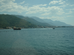 Boats at the Bay of Kotor, viewed from the tour bus on the E65 road at the town of Joice