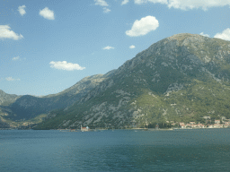 The Bay of Kotor with the Our Lady of the Rocks Island and the Saint George Island, viewed from the tour bus on the E65 road just east of the town of Kostanjica