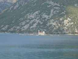 The Bay of Kotor with the Our Lady of the Rocks Island, viewed from the tour bus on the E65 road just east of the town of Kostanjica