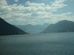 The Bay of Kotor with the Our Lady of the Rocks Island and the Saint George Island and the town of Perast, viewed from the tour bus on the E65 road at the town of Lipci