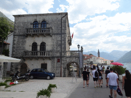 Front of the Muzej Grada Perasta museum at the promenade and the Church of Saint Nicholas