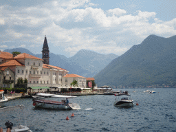 The Church of Saint Nicholas and boats at the Bay of Kotor, viewed from the promenade