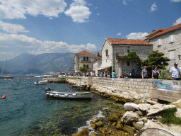 The promenade and boats at the Bay of Kotor, viewed from the Perast Harbour