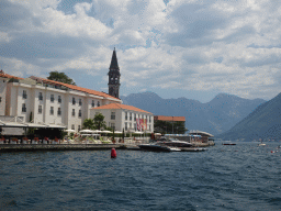 Boats in front of the town center with the Church of Saint Nicholas, viewed from the ferry from the town center to the Our Lady of the Rocks Island