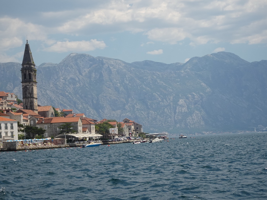 Boats in front of the town center with the Church of Saint Nicholas, viewed from the ferry from the town center to the Our Lady of the Rocks Island