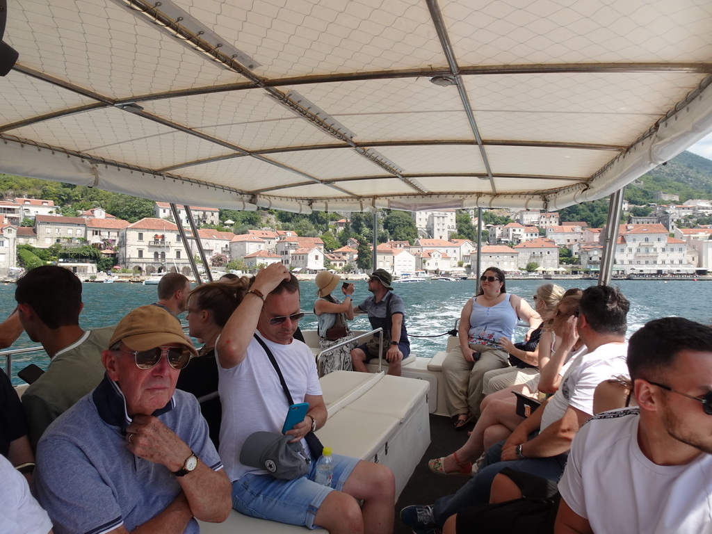 The ferry to the Our Lady of the Rocks Island, with a view on the town center