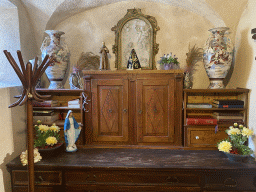 Closet with books, vases and other items at the ground floor of the museum at the Church of Our Lady of the Rocks at the Our Lady of the Rocks Island