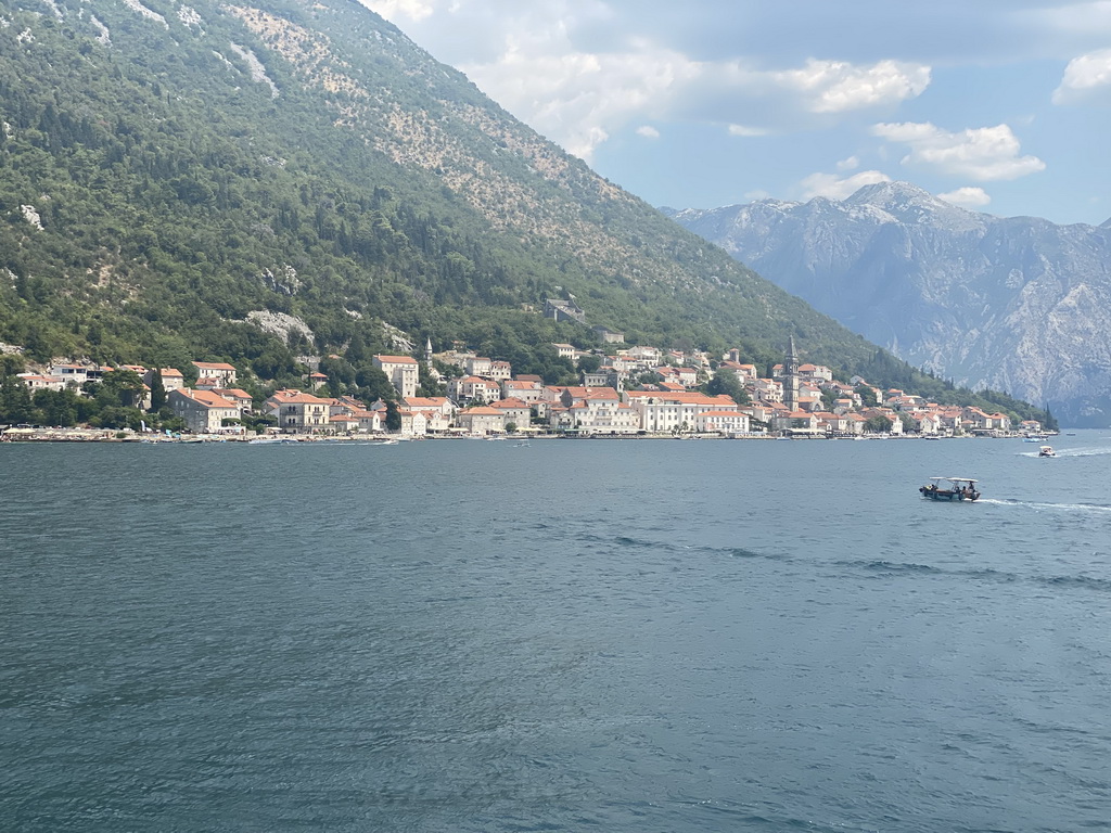 Boats in front of the town center with the Church of Saint Nicholas, the Tvrdava sv. Kria fortress, the Zmajevic Palace and the Crkva Gospe od Ruarija church, viewed from the upper floor of the museum at the Church of Our Lady of the Rocks at the Our Lady of the Rocks Island