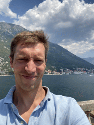 Tim at the roof terrace of the Church of Our Lady of the Rocks at the Our Lady of the Rocks Island, with a view on the Bay of Kotor and the town center