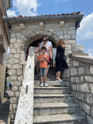 Miaomiao and Max eating ice cream at the staircase from the roof terrace of the Church of Our Lady of the Rocks at the Our Lady of the Rocks Island