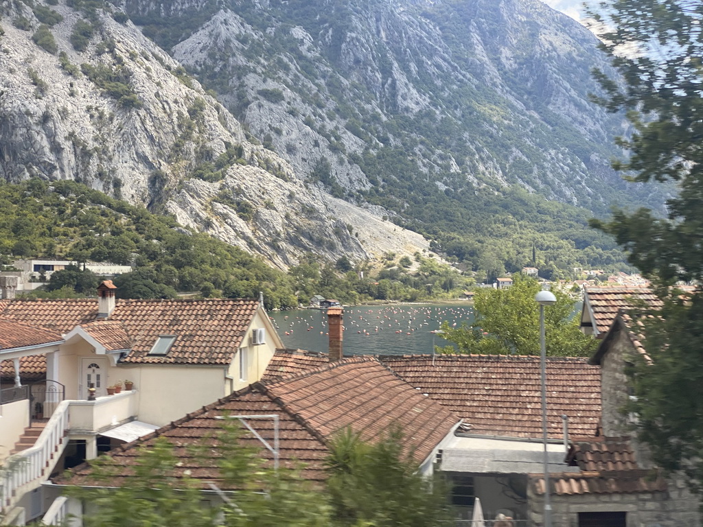 Houses at the town of Orahovac and oyster farm at the town of Ljuta, viewed from the tour bus on the E65 road