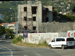 Building under renovation at the town of Risan, viewed from the tour bus on the E65 road