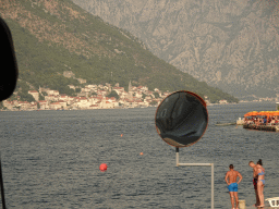 The Bay of Kotor and the town of Perast, viewed from the tour bus on the E65 road at the town of Kostanjica