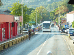 Buildings and trees at the town of Zelenika, viewed from the tour bus on the E65 road