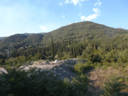 Hills and trees just northwest of the town of Igalo, viewed from the tour bus on the E65 road