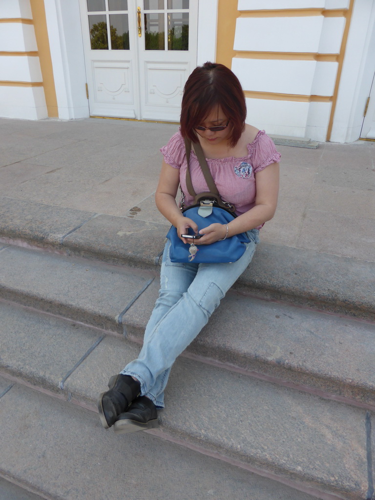 Miaomiao on the steps in front of the Great Palace