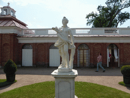 Miaomiao and a statue at the back side of the Monplaisir Palace