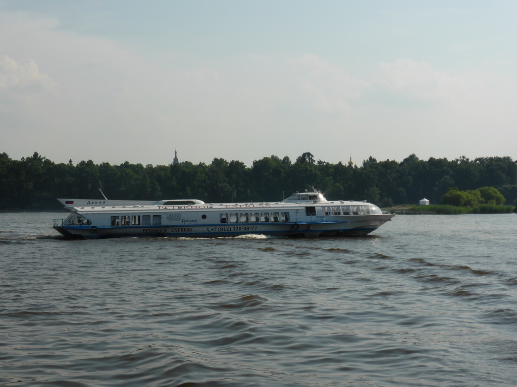 Hydrofoil in the Gulf of Finland and the towers of the St. Peter and Paul Cathedral, viewed from the hydrofoil to Saint Petersburg