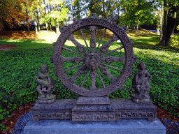 Dharmachakra wheel at the front garden of the Castle of Petite-Somme