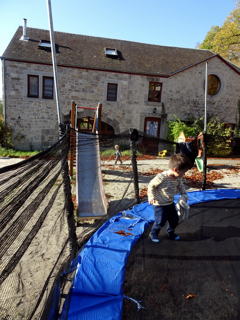 Max at the trampoline at the playground of the Castle of Petite-Somme