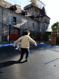 Max at the trampoline at the playground of the Castle of Petite-Somme