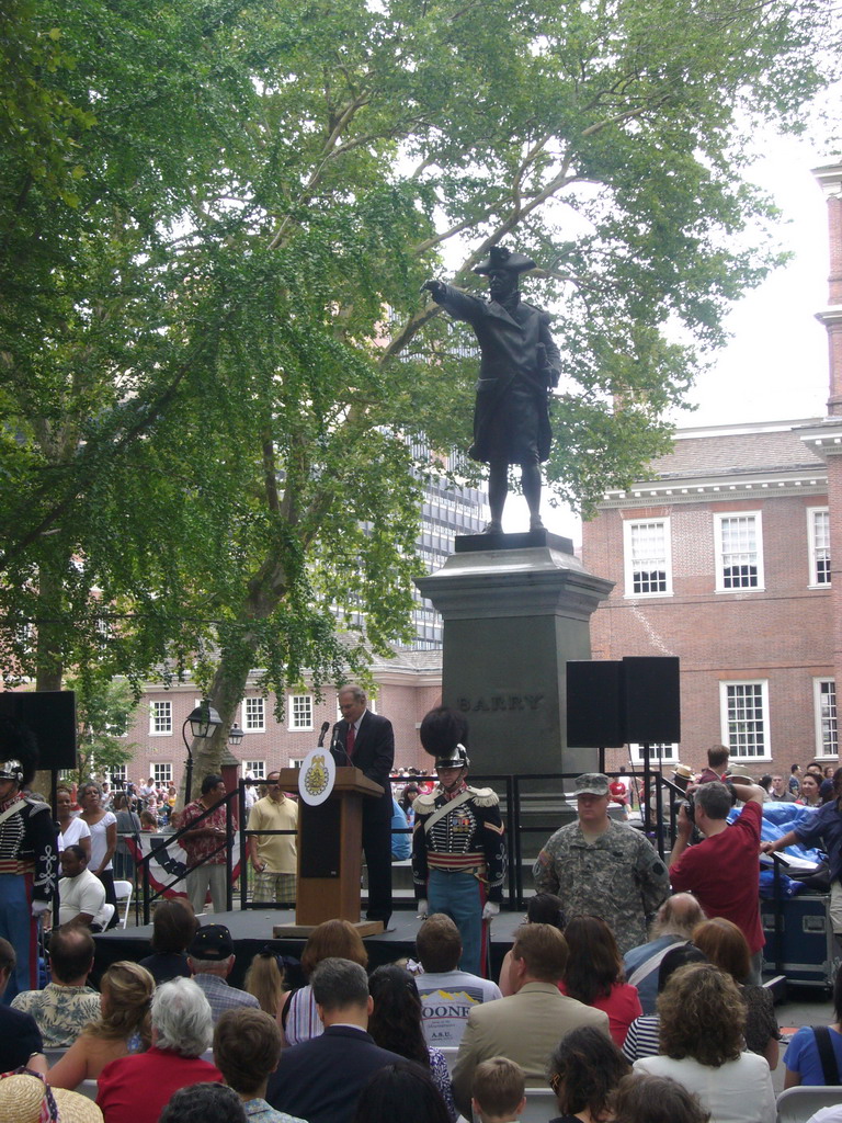 Independence Day ceremony at Independence Square, with the Commodore John Barry statue