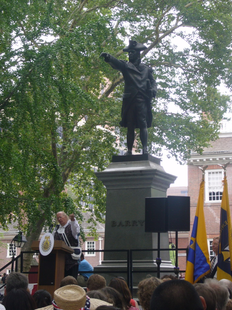 Independence Day ceremony at Independence Square, with the Commodore John Barry statue